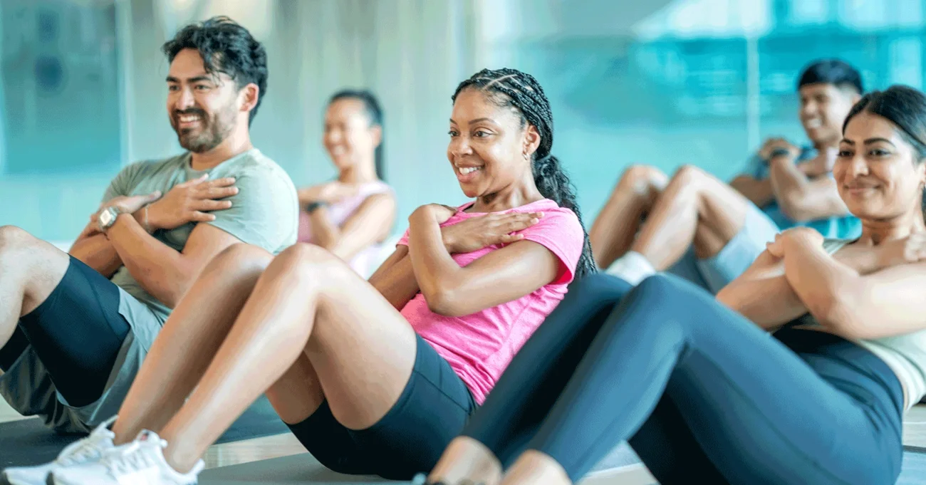 group of people in a workout class